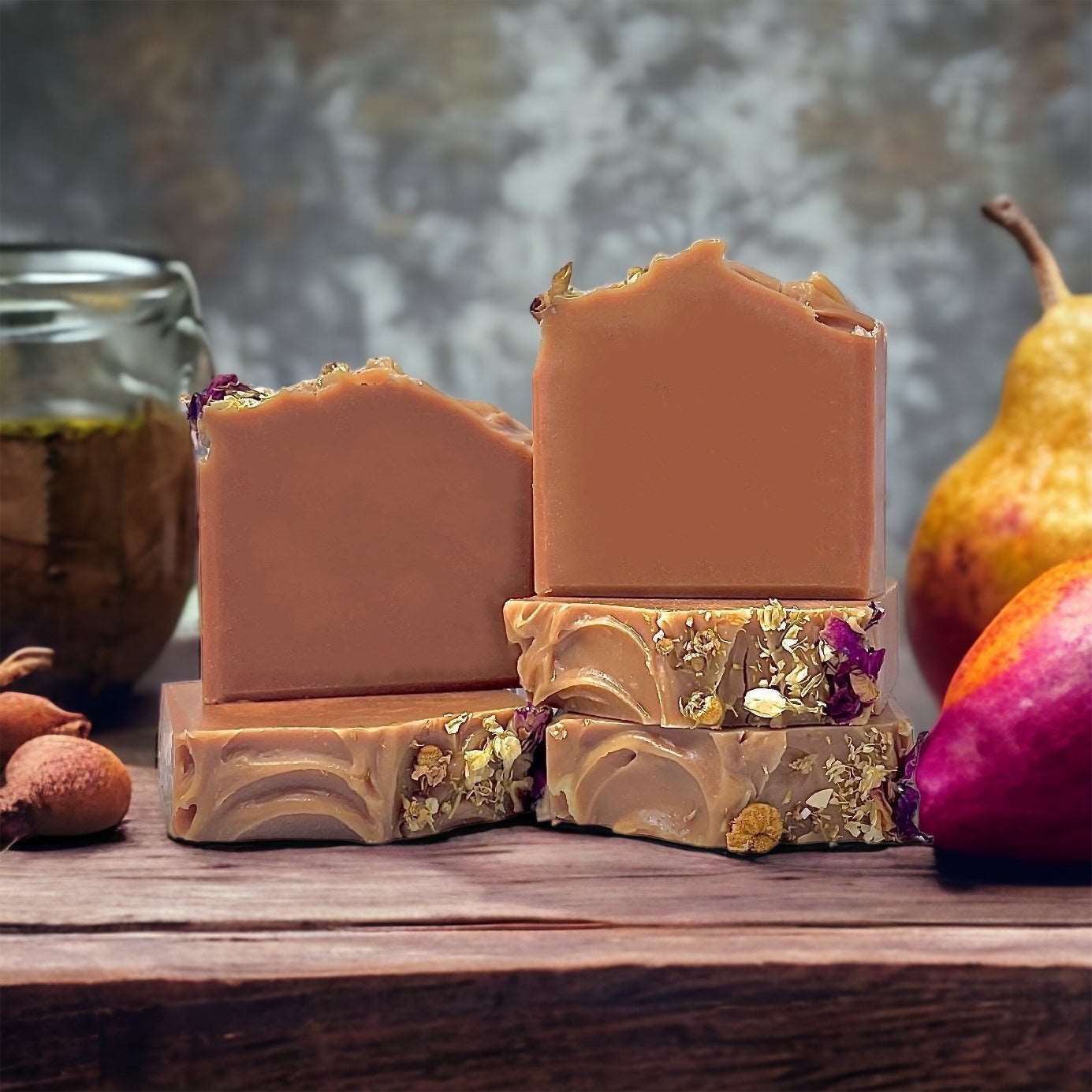 a couple of bars of chocolate sitting on top of a wooden table